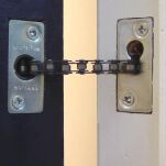 Samozamykacz sprężynowo-łańcuchowy do drzwi serwisowych Flexi Force nr kat. 1034S